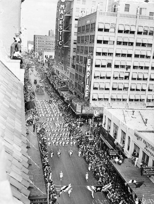 Battle of Flowers Parade at intersection of Houston and St. Mary's Streets, 1940