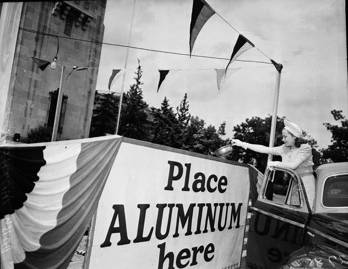 Daisy Mathews donates to scrap aluminum drive, 1941