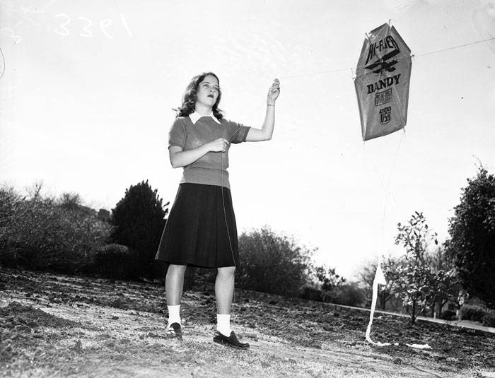 Sally Farnsworth flying a kite, 1947
