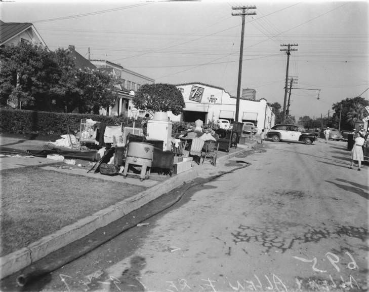 Photograph of furniture moved out of houses endanger of the fire at the Allen and Allen lumberyard, 1947