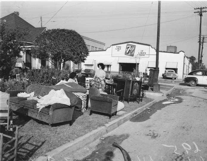 Furniture moved out of houses endanger of the fire at the Allen and Allen lumberyard, 1947