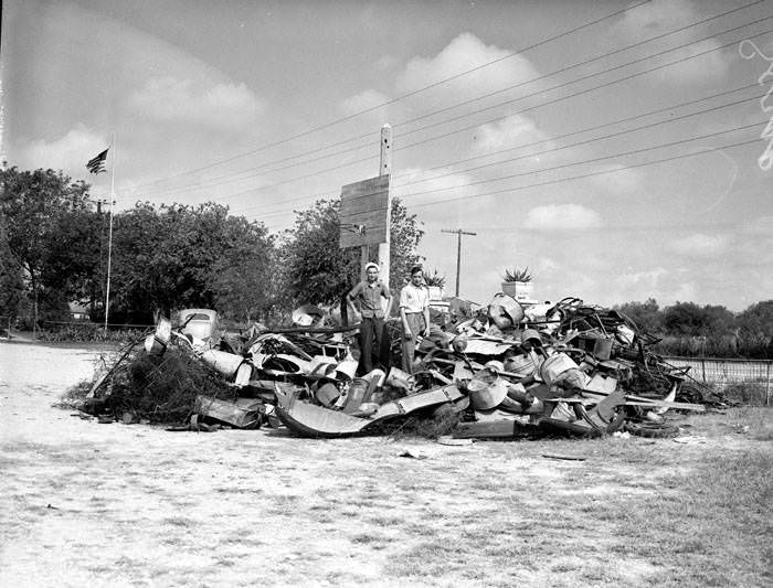 Scrap metal pile at Leon Springs school, 1942