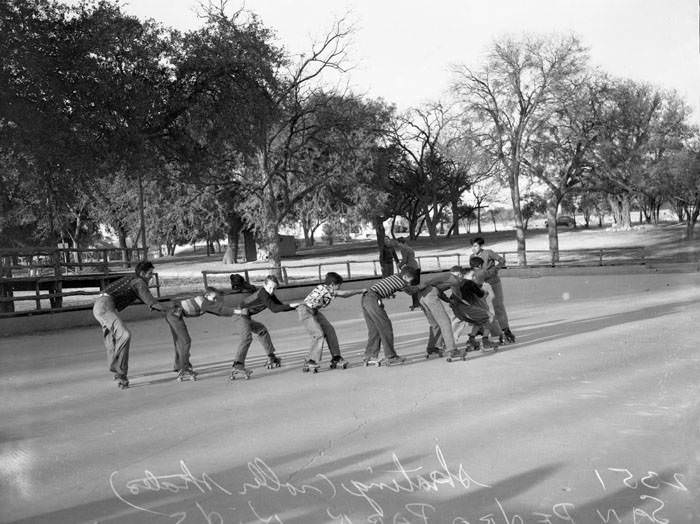 Children roller skating in San Pedro Park, 1940