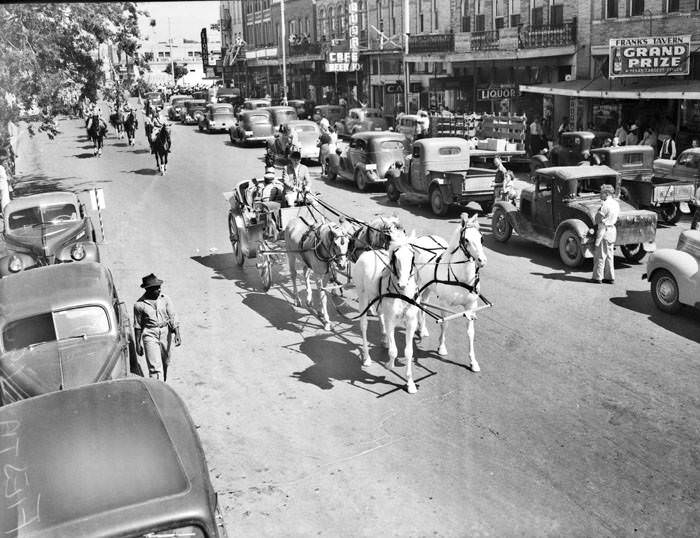 Looking southeast towards 1100 block of East Commerce Street just after arrival of King, 1940
