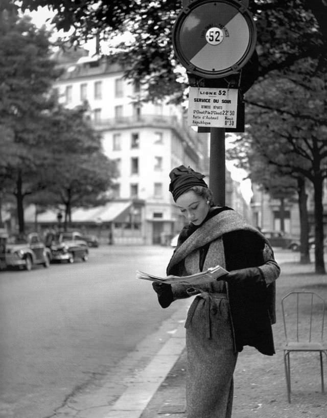 Sophie Litvak in tweed dress with reversible tweed stole lined in otter by Lanvin-Castillo, Elle, September 8, 1952