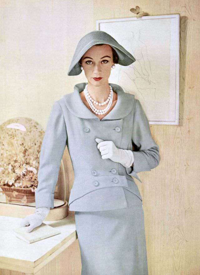 Sophie Malgat in beautiful pale blue linen suit by Jean Patou, 1953