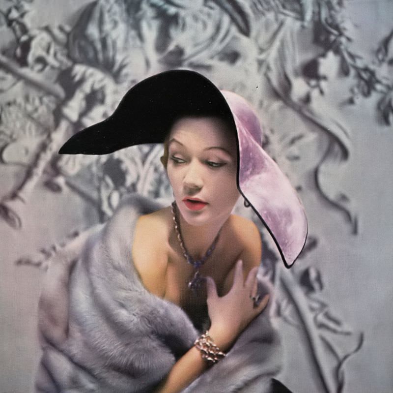Sophie Malgat is wearing a romantic hat in amethyst panne velvet lined in black by Paulette, Harper's Bazaar UK, October 1950
