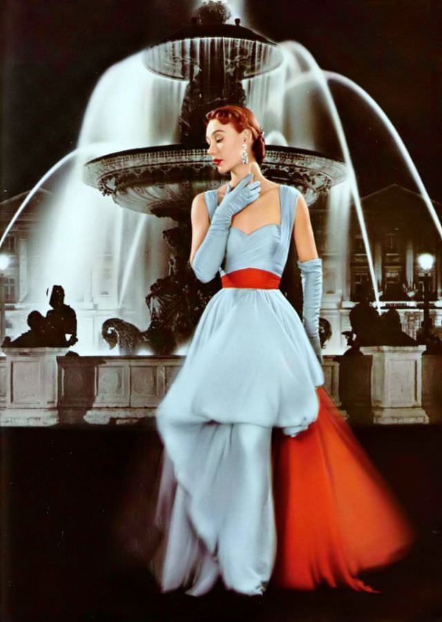 Sophie Malgat in an artfully draped pale blue and red mousseline evening gown by Jean Desses, L'Officiel, 1951