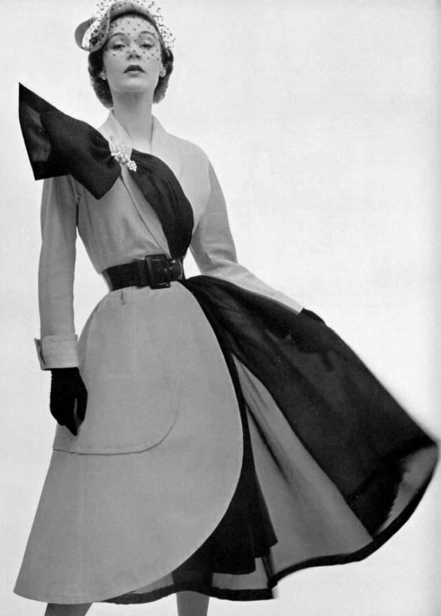 Sophie Malgat in beige alpaca coat dress over black organza skirt by Jacques Fath, 1951