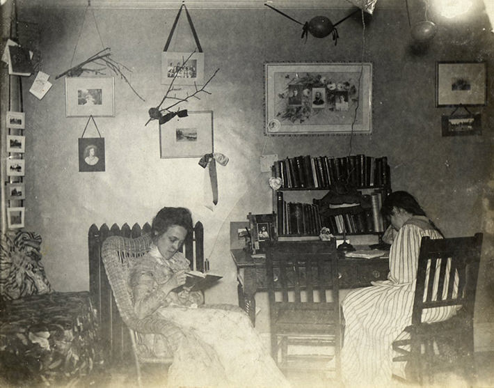 Photographs and mementos kept things homey in this room, 1899.