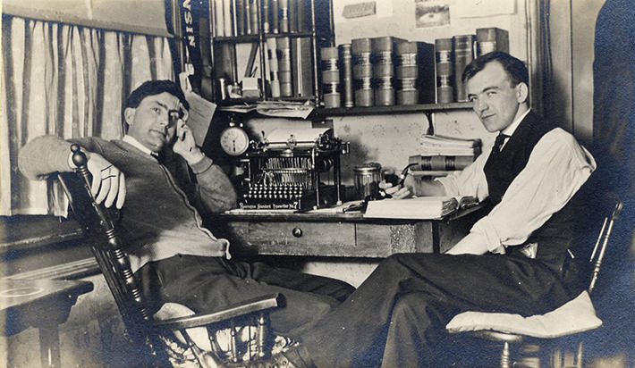 Male students room in boarding house or fraternity, 1909.