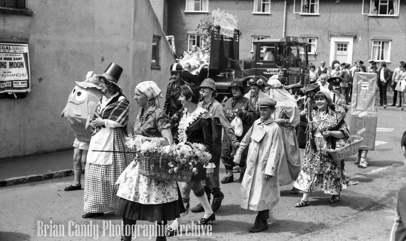 People in Fancy Costumes Celebrating the Synwell Carnival in Wotton-under-Edge in the Late 1960s