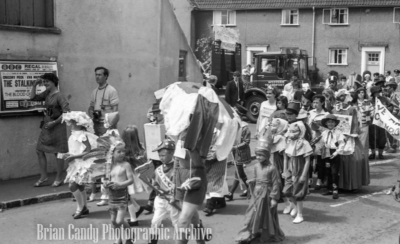 People in Fancy Costumes Celebrating the Synwell Carnival in Wotton-under-Edge in the Late 1960s