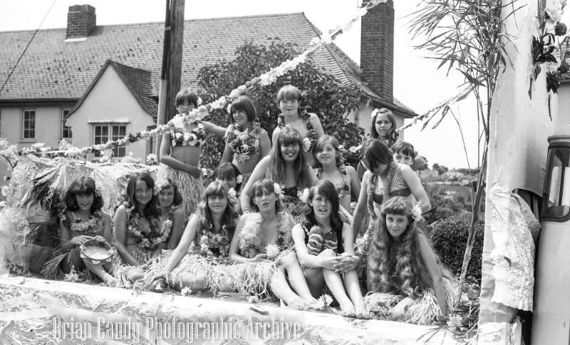 People in Fancy Costumes Celebrating the Synwell Carnival in Wotton-under-Edge in the Late 1960s