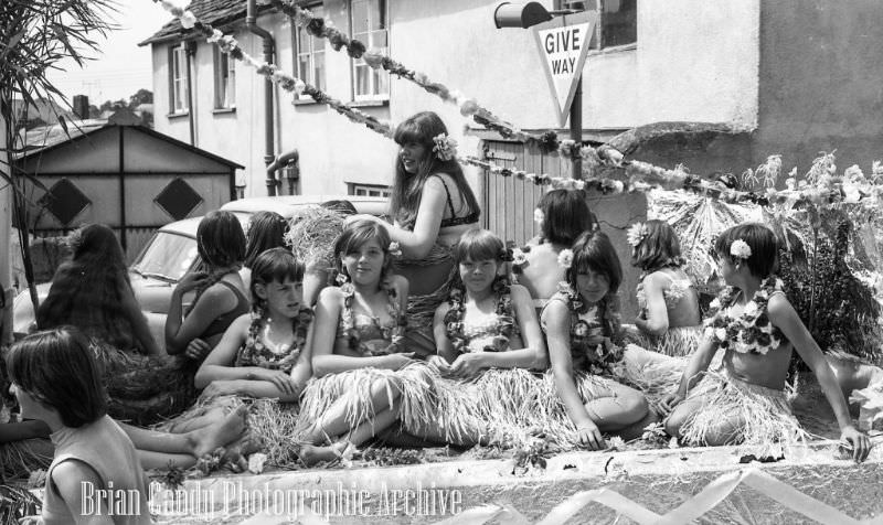 People in Fancy Costumes Celebrating the Synwell Carnival in Wotton-under-Edge in the Late 1960s