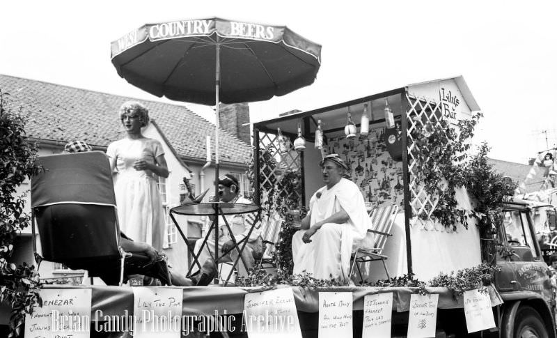 People in Fancy Costumes Celebrating the Synwell Carnival in Wotton-under-Edge in the Late 1960s