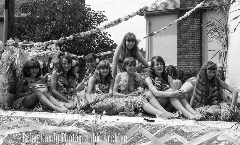 People in Fancy Costumes Celebrating the Synwell Carnival in Wotton-under-Edge in the Late 1960s