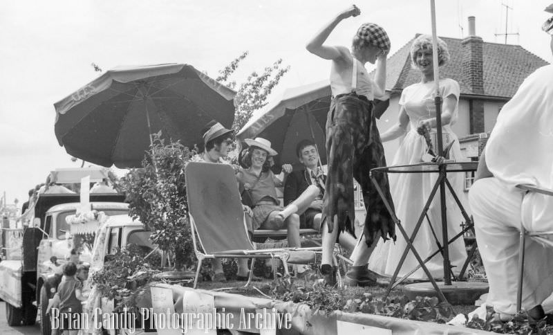 People in Fancy Costumes Celebrating the Synwell Carnival in Wotton-under-Edge in the Late 1960s