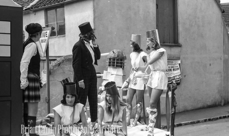 People in Fancy Costumes Celebrating the Synwell Carnival in Wotton-under-Edge in the Late 1960s