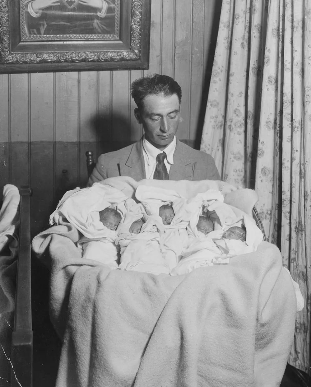 Mr. Dionne at home with his five daughters.