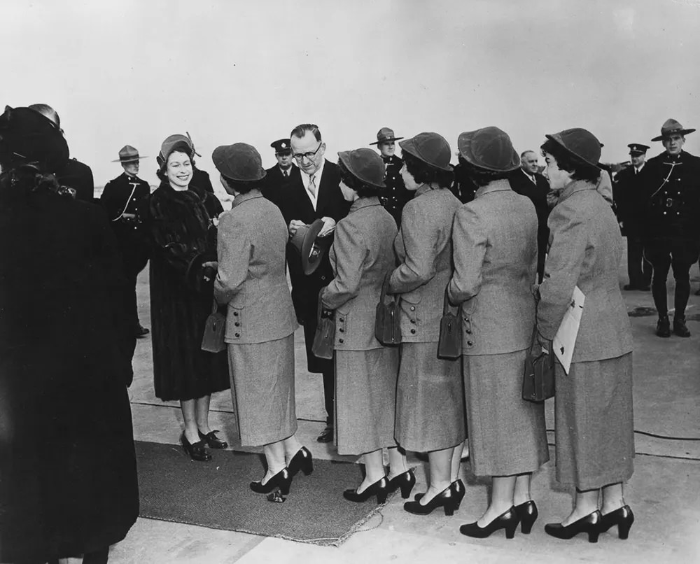 Princess Elizabeth (now Queen Elizabeth II) greets the Dionne sisters during a Canadian tour, 1951.