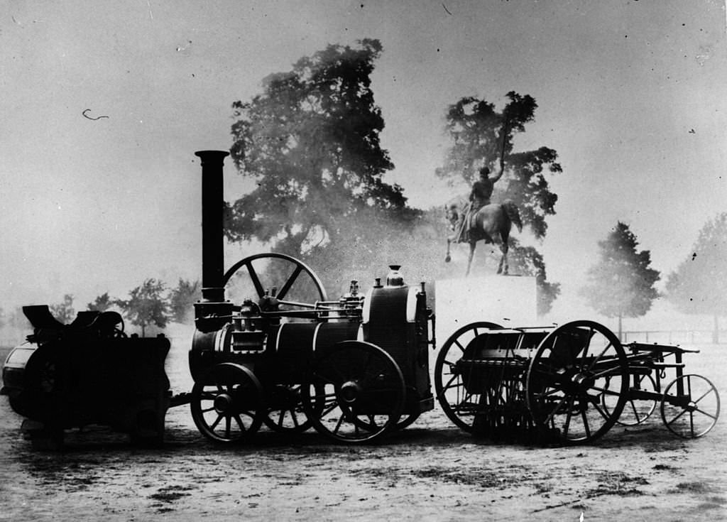 A display of a portable steam engine corn threshing machine and a seed drill on show at the Great Exhibition, Crystal Palace, Hyde Park in London.