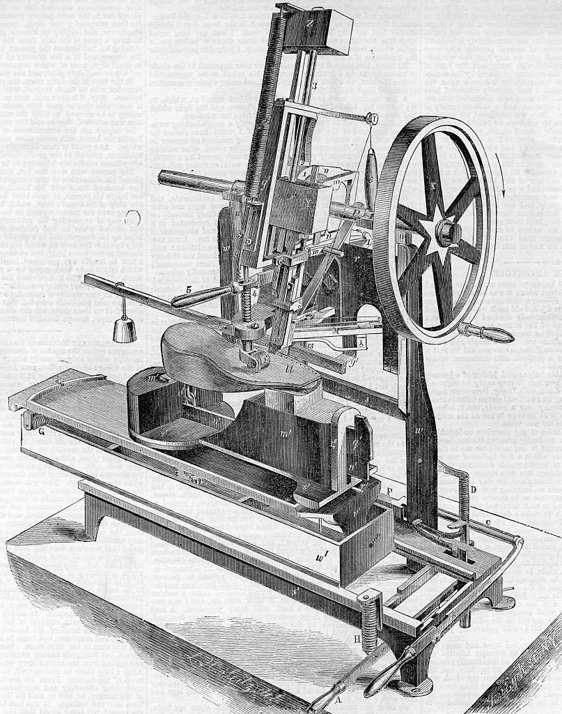 Engraved illustration of a Boot And Shoe Pegging Machine, at the Crystal Palace, a cast-iron and plate-glass structure originally built in Hyde Park, London, England, to house the Great Exhibition, 1851.