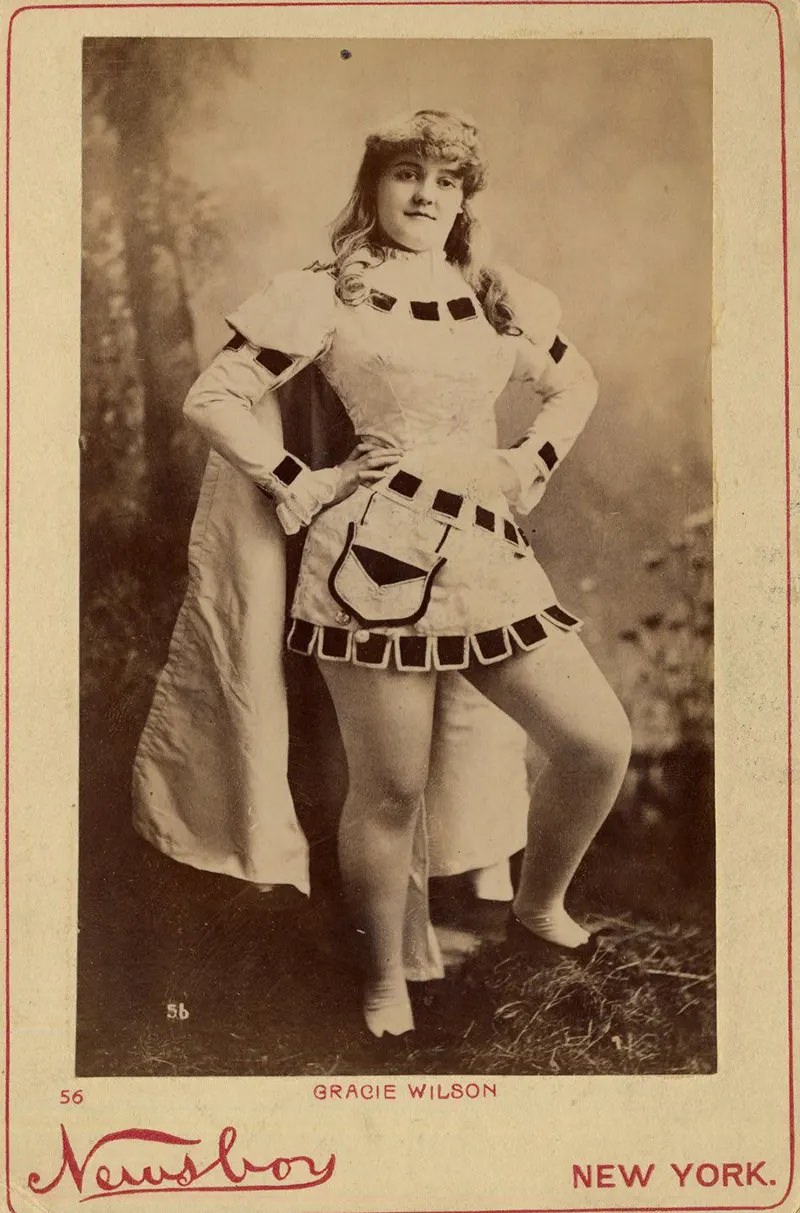 Gracie Wilson in costume with a cape.