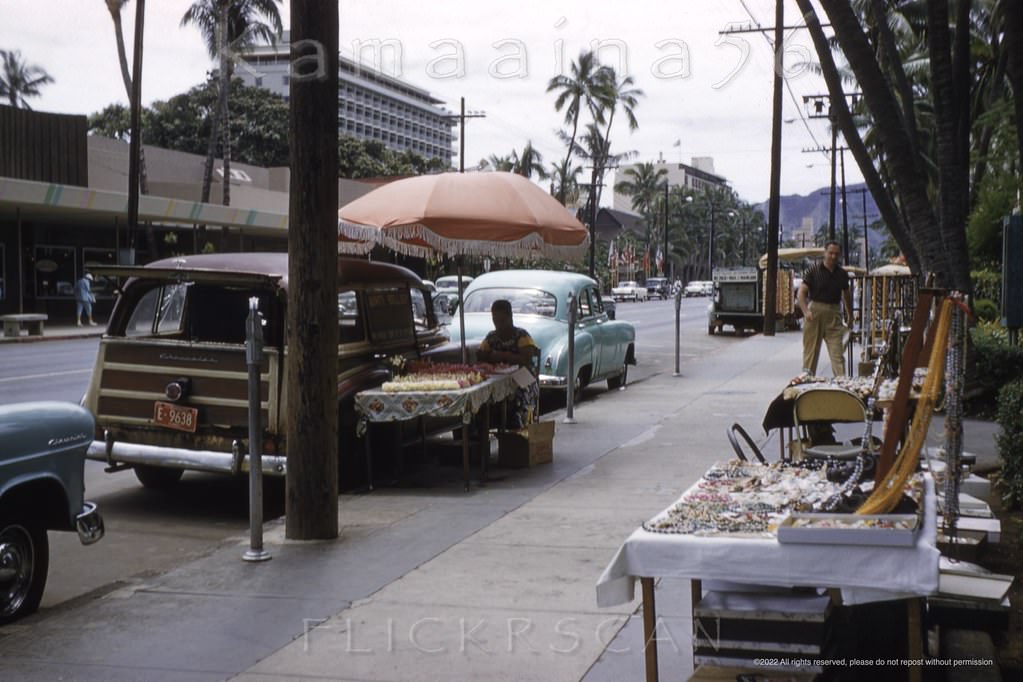 Diamond Head view (more or less east) along Waikiki’s Kalakaua Avenue from the street front of the Royal Hawaiian Hotel, 1958.