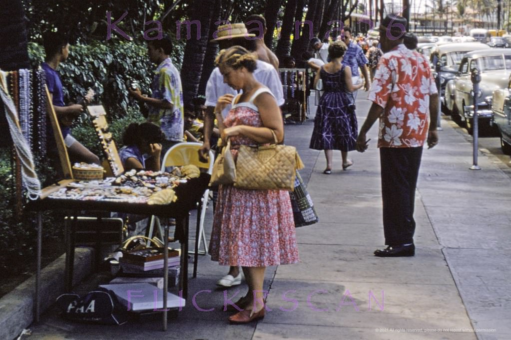 Sellers on Waikiki’s Kalakaua Avenue along the Royal Hawaiian Hotel Street front, 1950s
