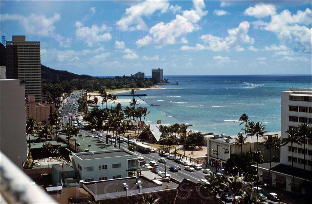 View along Waikiki’s Kalakaua Ave. looking towards the new Waikiki Beach Center from an upper floor of the Princess Kaiulani Hotel, 1962.