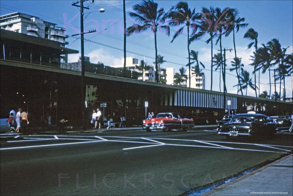 Waikiki's Kalakaua Avenue looking makai (towards the ocean) from the old Royal Hawaiian Avenue driveway (out of frame and across the street at left), 1960s
