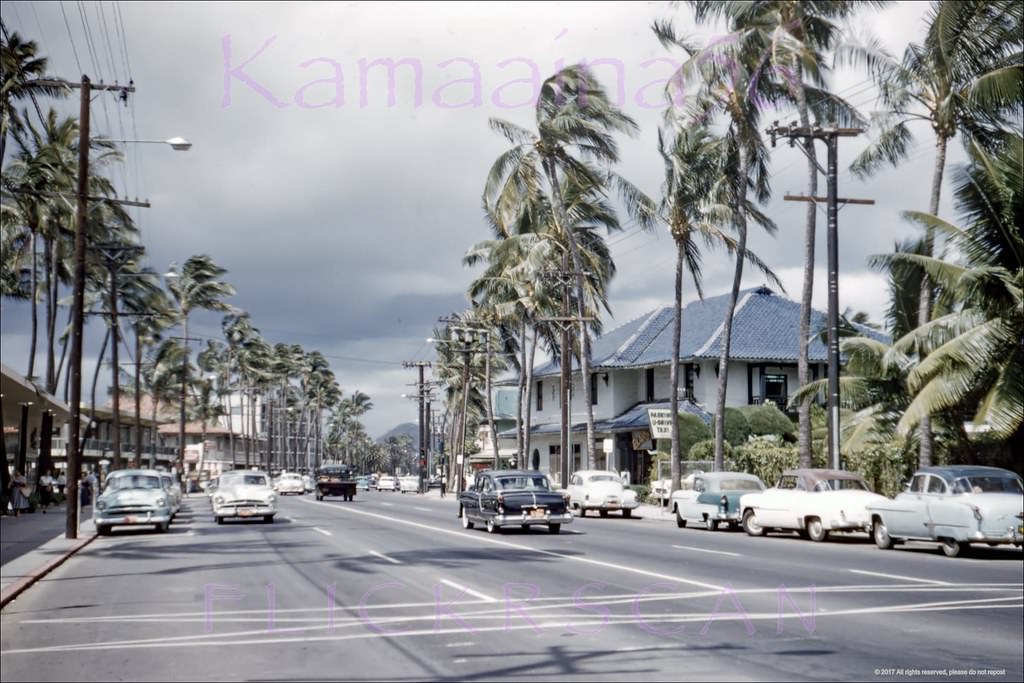 Waikiki’s Kalakaua Avenue looking ewa from the Royal Hawaiian Hotel's original driveway, 1958