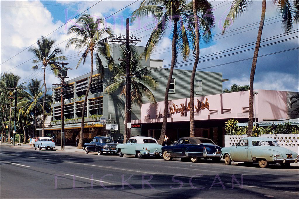 Winifred Dick ladies' clothes and liquor store (now that's positive reinforcement for the hubbies!) next door to the Waikiki Medical Building on Kalakaua Avenue, 1954.