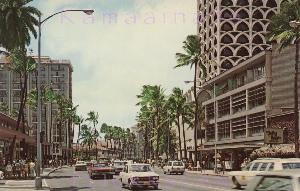 Ewa view (more or less west here) along Kalakaua Avenue between Royal Hawaiian and Lewers back when Kalakaua was still a two-way street and after the on-street parking and parking meters were gone, 1969