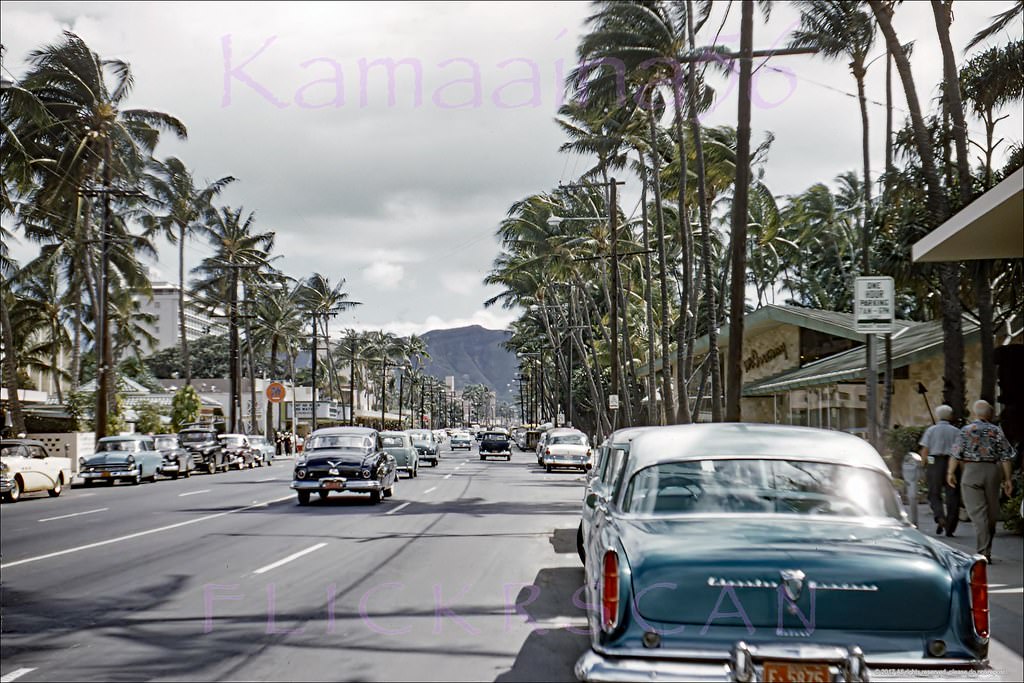 Waikiki’s Kalakaua Avenue looking Diamond Head from just before the Royal Hawaiian Hotel's old driveway at right, 1958
