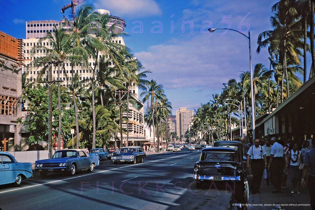 Late afternoon light looking east along Waikiki’s Kalakaua Avenue from near the Lewers Street intersection, 1965