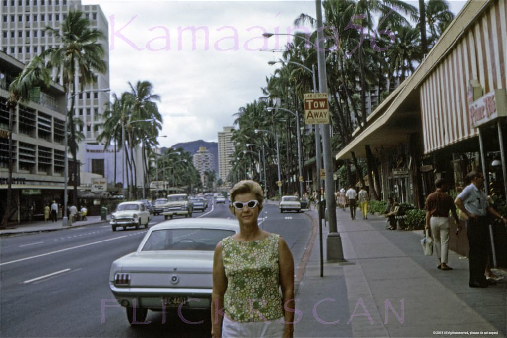 Looking east along Waikiki’s Kalakaua Avenue from the intersection with Royal Hawaiian Avenue at left, 1966