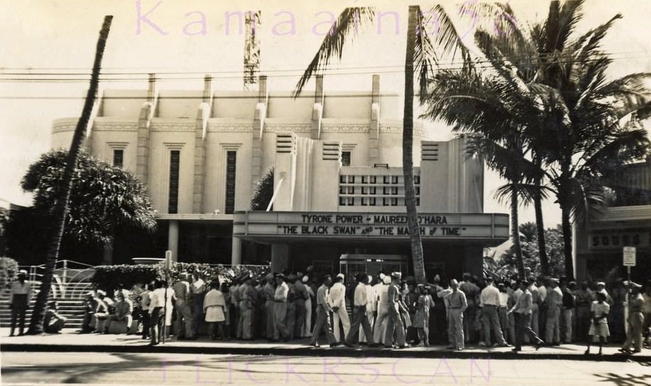 Quite a crowd of uniformed servcemen and a few civilians showed up at the Waikiki Theater on Kalakaua Avenue, 1943