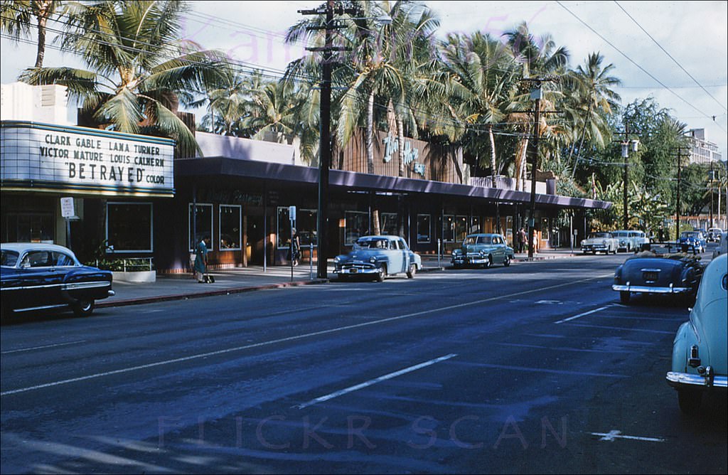 The Clark Gable/Lana Turner movie “Betrayed” was playing at the Waikiki Theatre next to the Liberty House Waikiki department store, 1954