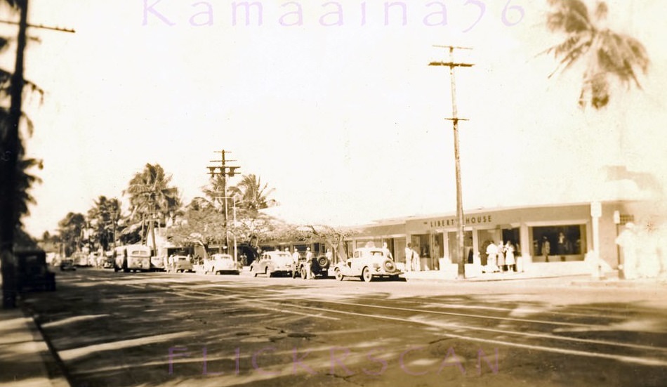 Overexposed but interesting view looking more or less west at the Waikiki Theater Block on Kalakaua Avenue, 1940s