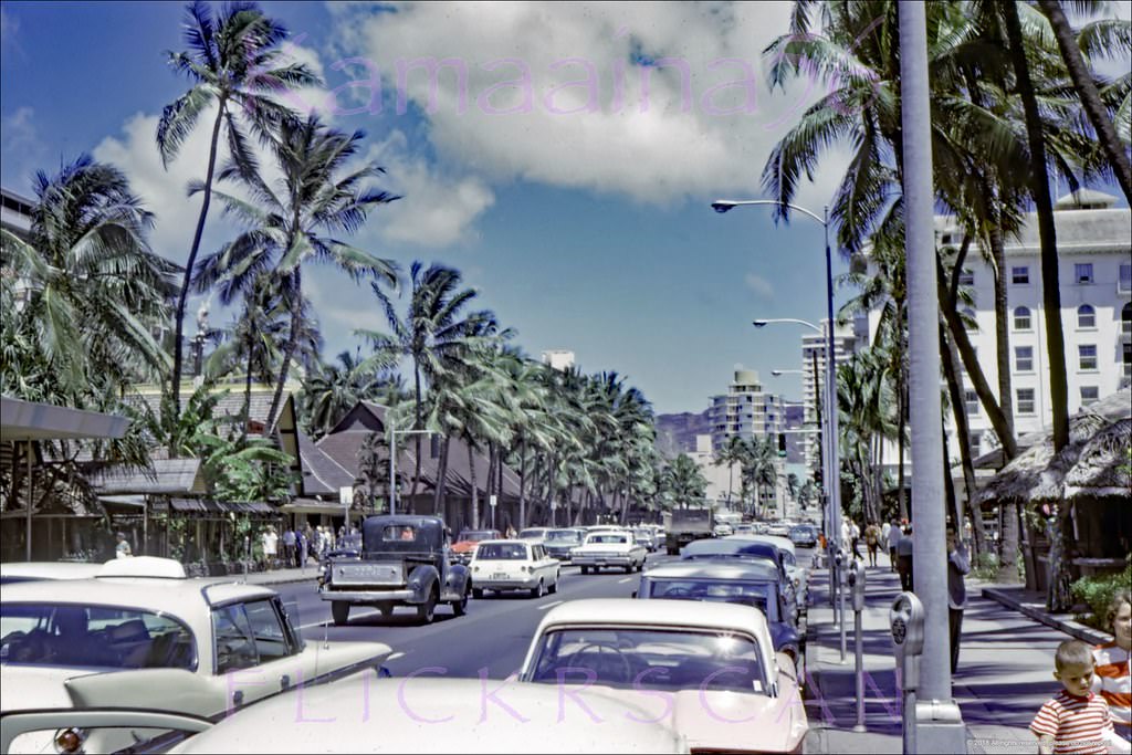 Detailed Street level snap looking Diamond Head along Waikiki’s Kalakaua Avenue, 1965