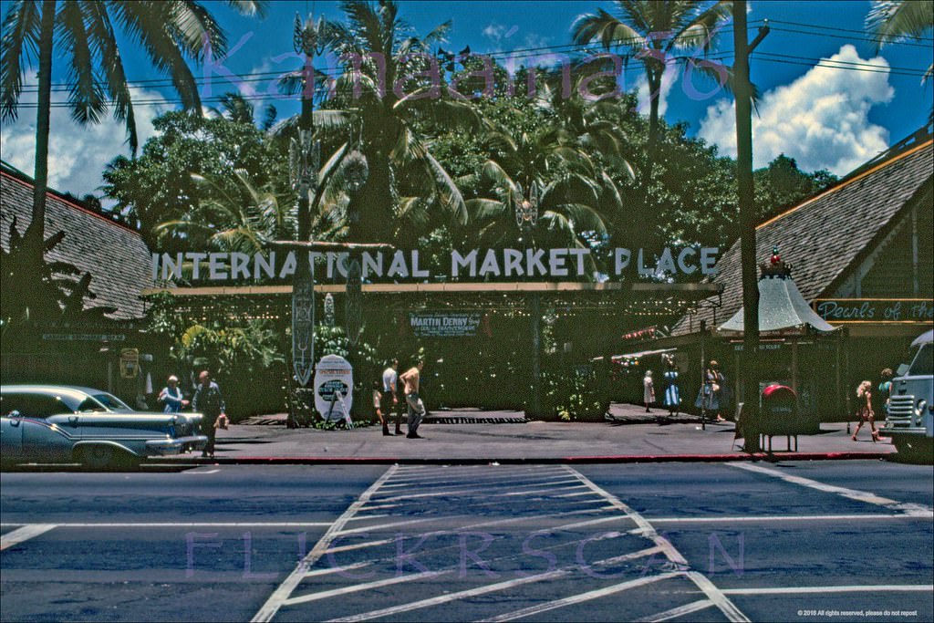 Looking mauka across Kalakaua Avenue towards the International Market Place, 1961