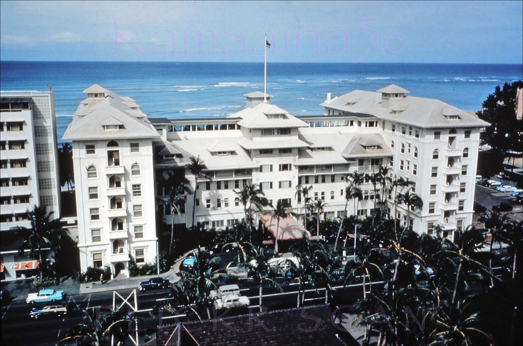 The historic 1901 Moana Hotel viewed from an upper floor at the Princess Kaiulani Hotel across Waikiki's Kalakaua Avenue, 1950s.