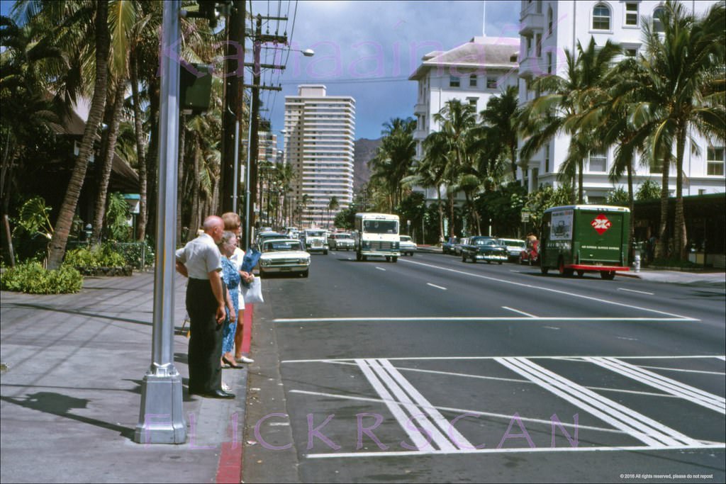 Waikiki’s Kalakaua Avenue looking Diamond Head from the crosswalk in front of the International Market Place, 1963