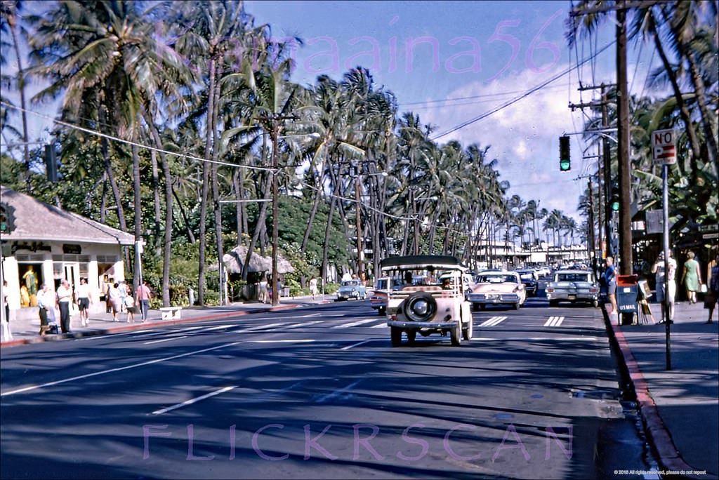 Waikiki’s busy Kalakaua Avenue looking more or less west here, 1960s