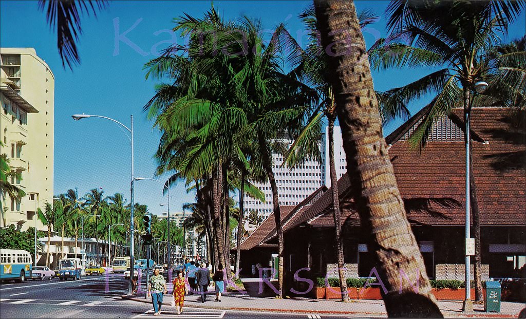 Looking west along Waikiki’s Kalakaua Avenue from the Kaiulani Avenue intersection, 1960s