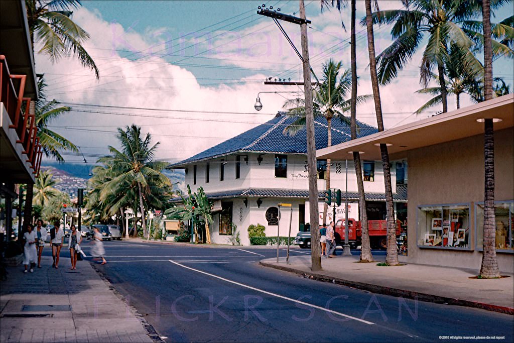 Looking mauka along Lewers Street towards the Kalakaua Avenue intersection in an uncrowded Waikiki, 1950s