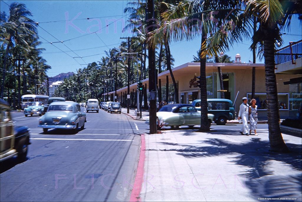 Looking Diamond Head (more or less east here) along Waikiki’s Kalakaua Avenue from the corner of Lewers Street, 1952