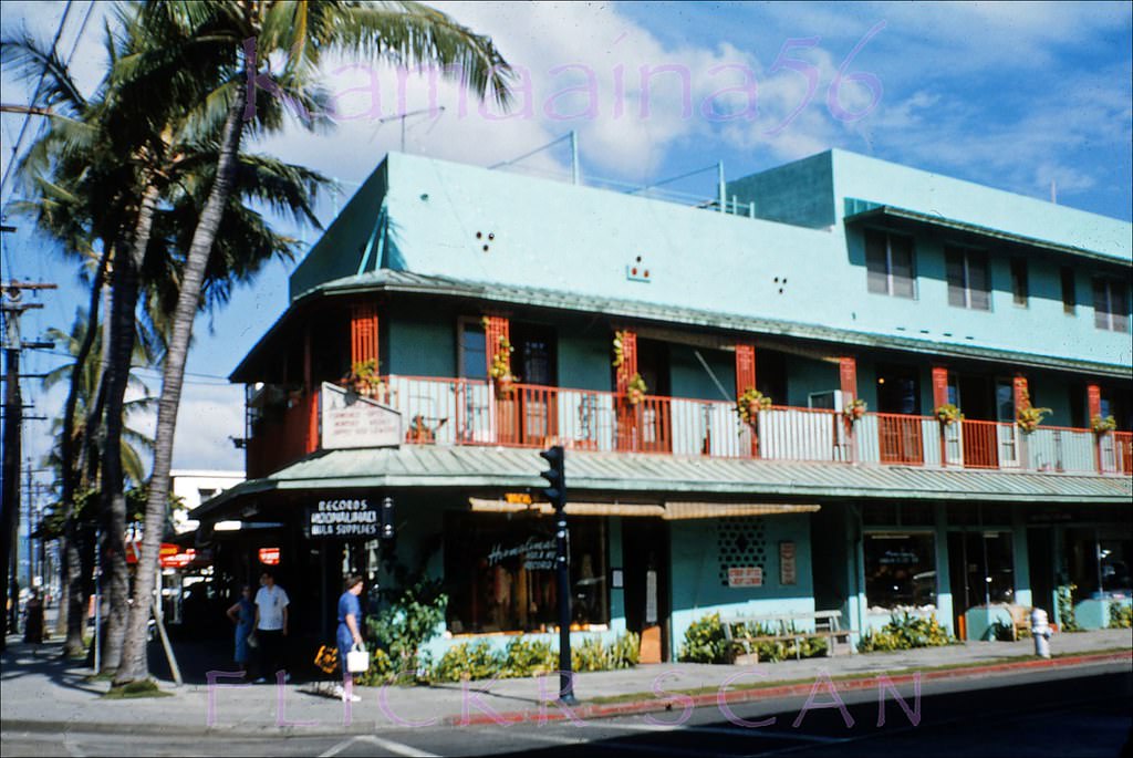 Hoomalimali Hula Hut and Record Bar, located on the NW corner of Kalakaua and Lewers in Waikiki according to their ad in the Paradise of the Pacific Holiday Annual, 1955.